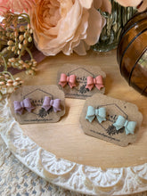 Load image into Gallery viewer, Textured bow Studs
